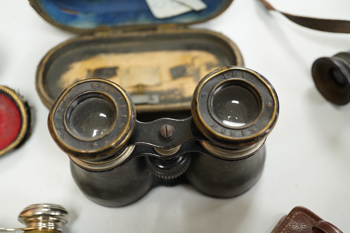 A Le Coultre desk timepiece, and four pairs of opera glasses